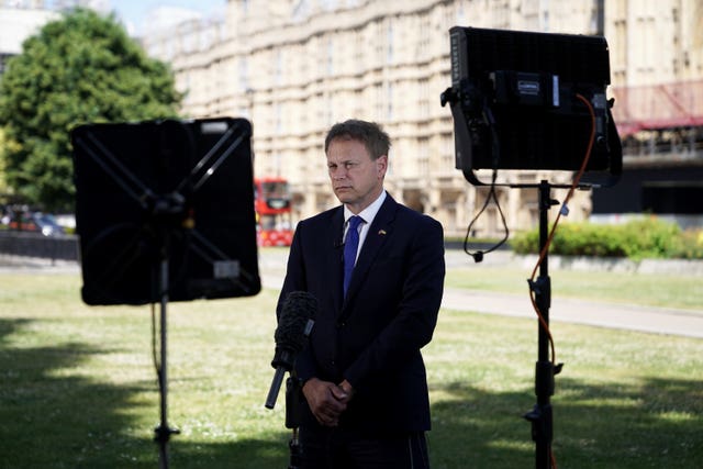Transport Secretary Grant Shapps speaks to the media on College Green, central London
