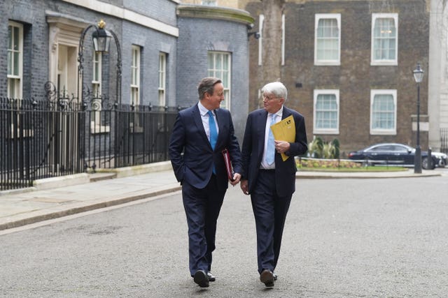 Lord Cameron and Andrew Mitchell in Downing Street