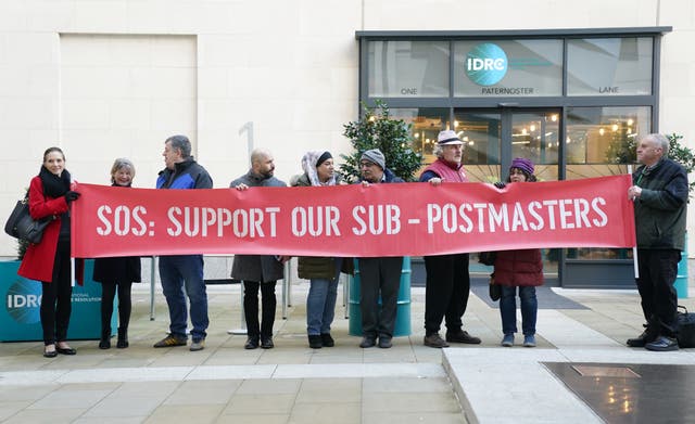 Protesters outside the Post Office Horizon IT inquiry in London