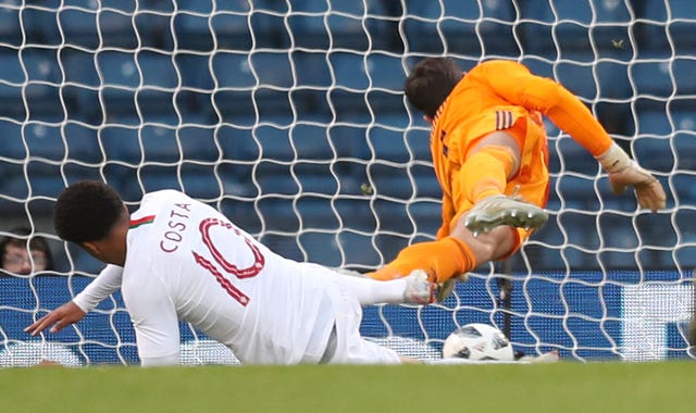 Portugal’s Helder Costa scores his side’s first goal 