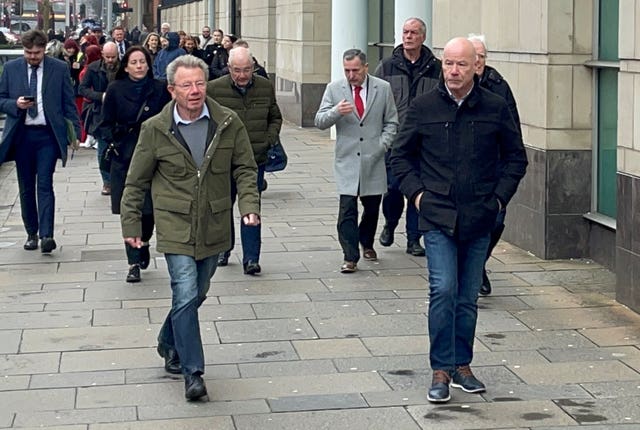 Members of William McKinney’s family and supporters arrive at Laganside courts in Belfast ahead of the latest hearing in the prosecution of Soldier F