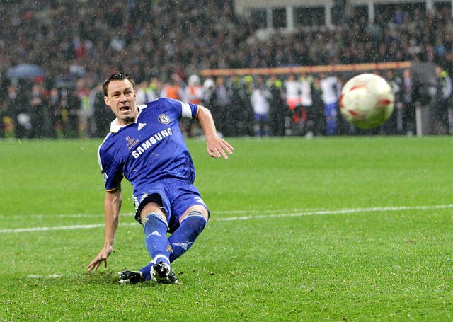 John Terry watches his penalty head towards the post