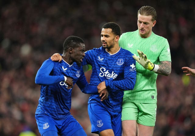 Everton’s Idrissa Gana Gueye is held back after a confrontation with Michael Keane