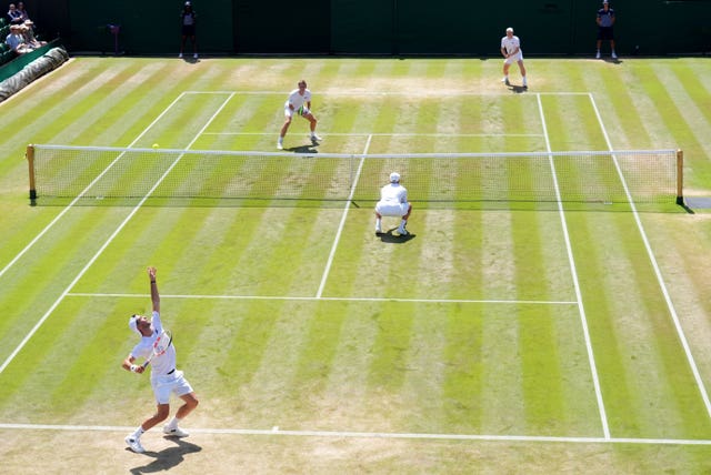Julian Cash and Lloyd Glasspool, bottom, take on Henry Patten and Harri Heliovaara 