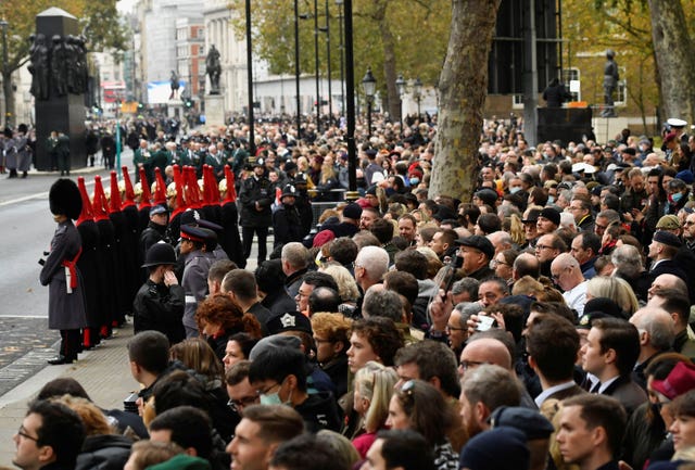 Crowds gather ahead of the service at the Cenotaph