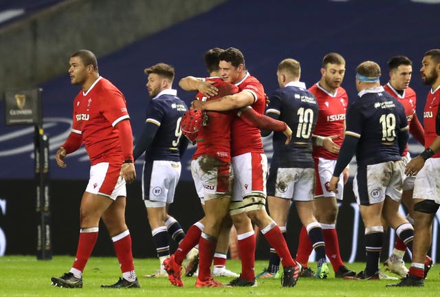 Wales celebrate a tense 25-24 victory over Scotland