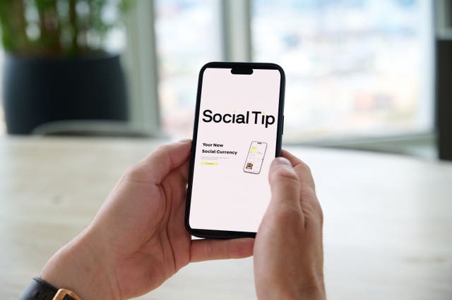 The Social Tip app on a mobile phone screen 