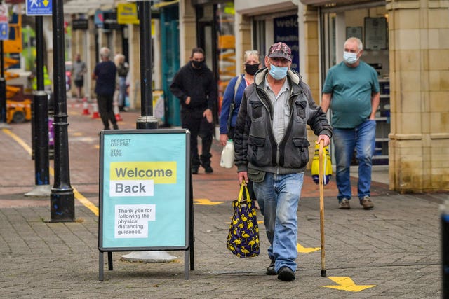 Shoppers wearing masks in Caerphilly (Ben Birchall/PA)
