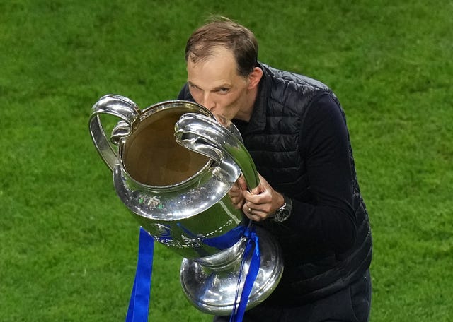 Thomas Tuchel kisses the Champions League trophy