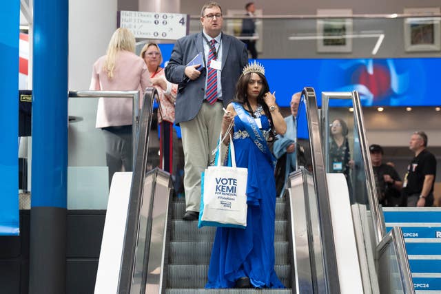 A woman with a Vote Kemi bag 