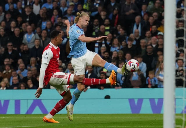 Erling Haaland shoots at goal during City's win over Arsenal in April (Martin Rickett/PA)