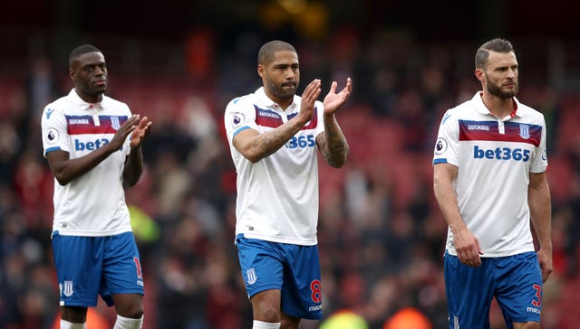 Martins Indi (left) was not happy after conceding a soft penalty in Stoke's defeat.