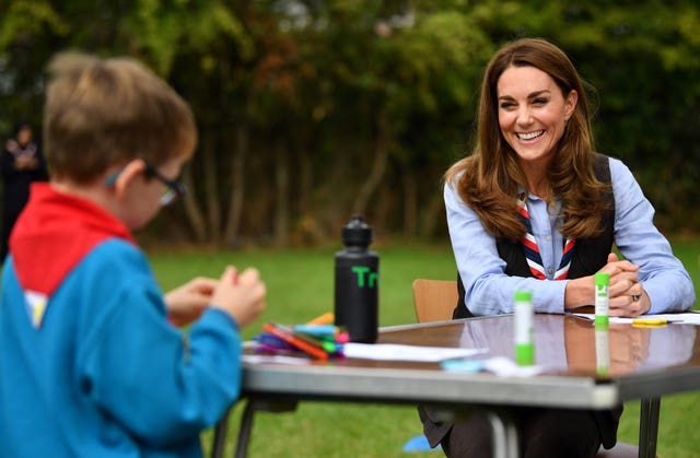 The Duchess of Cambridge joins Cubs and Beaver Scouts in outdoor activities during a visit to the 12th Northolt Scouts in West London