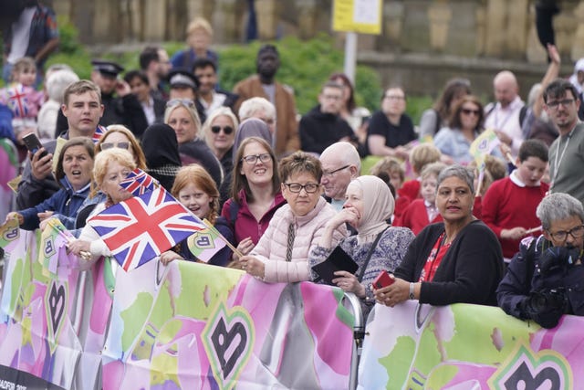 Wellwishers await the arrival of Charles and Camilla in Bradford