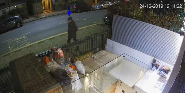 CCTV grab of a man wearing dark clothing outside the home of Flamur Beqiri 