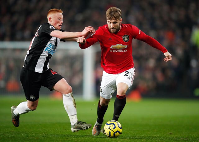 Luke Shaw, right, has expressed his reservations about playing matches behind closed doors