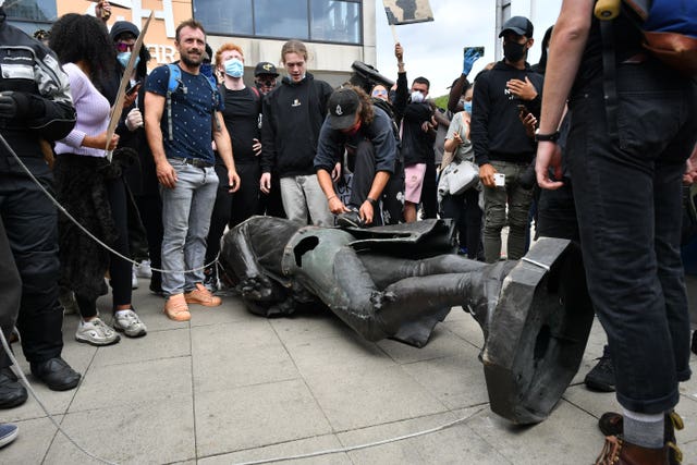 Protesters dragging the statue of Edward Colston to Bristol harbourside (Ben Birchall/PA)