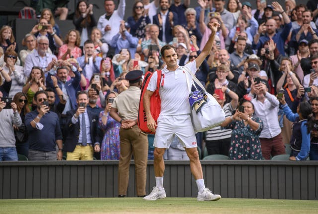 A final Wimbledon wave? Federer salutes the crowd after his defeat to Hubert Hurkacz in the quarter-finals at this year's Wimbledon