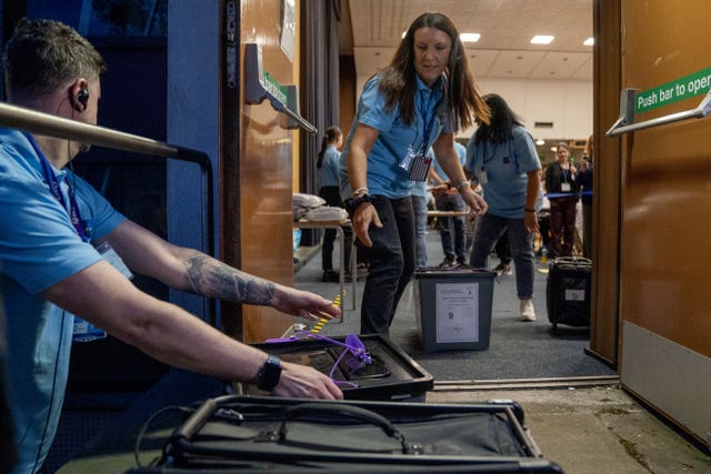 Ballot boxes for the Hamilton, Larkhall and Stonehouse by-election being brought into the count room