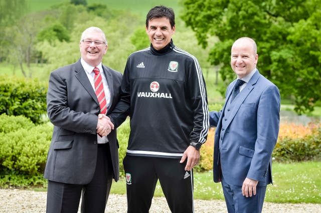 Former Wales’ national football team manager Chris Coleman (centre) with Football Association Wales president David Griffiths (left) and Football Association Wales chief executive Jonathan Ford after a press conference