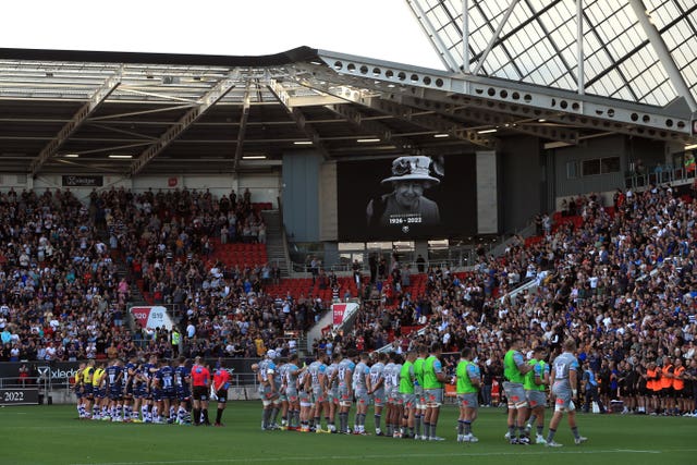 Players and fans at Bristol observe a minute’s silence in honour of the Queen 