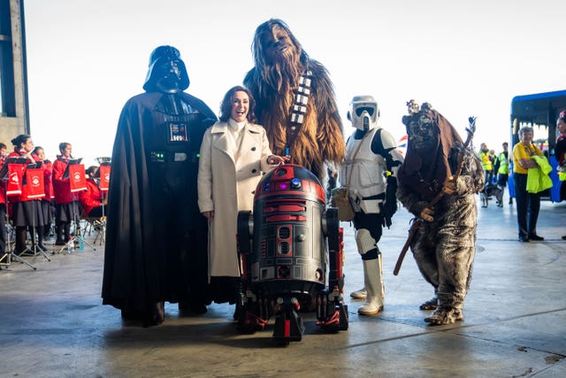 Shirley Ballas surrounded by Star Wars characters including Darth Vader and Chewbacca