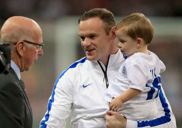 Rooney is greeted by Sir Bobby Charlton ahead of his 100th England cap in a Euro 2016 qualifier against Slovenia.