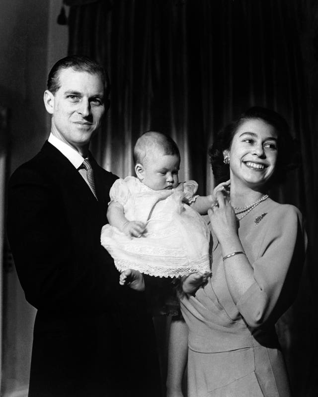 Charles is pictured aged six months with the Queen and Duke of Edinburgh (PA Wire)