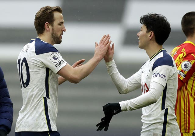 Goalscorers Harry Kane, left, and Son Heung-min celebrate after the game