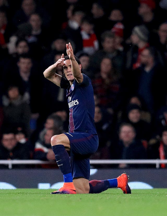 Edinson Cavani celebrates scoring for Paris St Germain against Arsenal