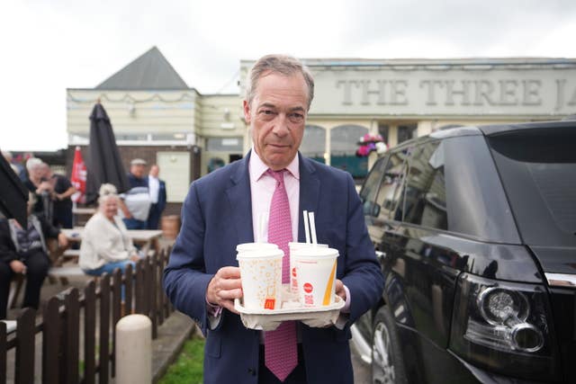 Mr Farage later posed with a tray of McDonalds banana milkshakes in Jaywick, Essex 