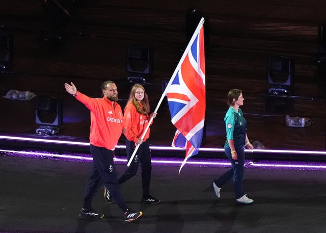 Great Britain’s Matt Bush and Poppy Maskill with the Union flag