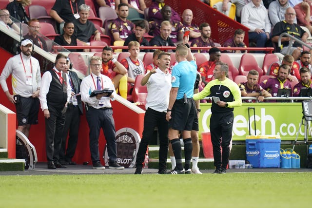 Leeds manager Jesse Marsch is shown a red card by the referee