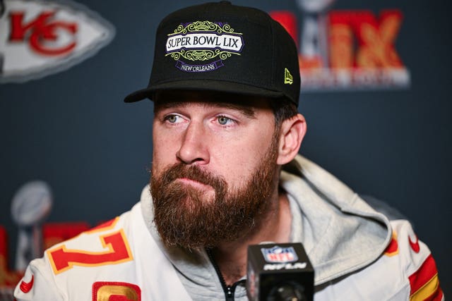 Travis Kelce speaks to journalists