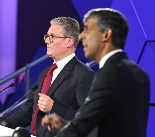 Sir Keir Starmer and Rishi Sunak, both looking left, during an election debate