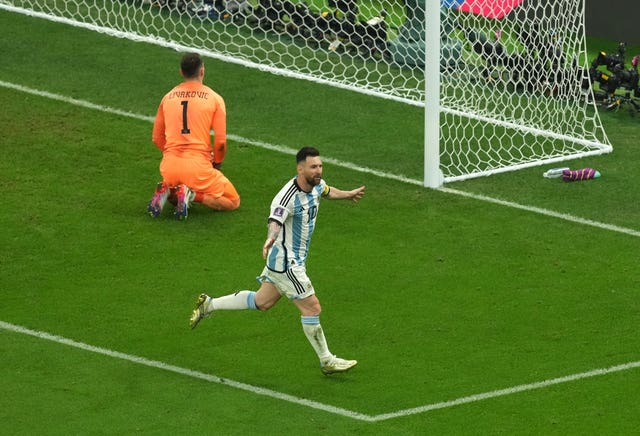 Lionel Messi, right, celebrates his goal