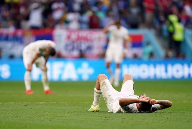 Serbia's Aleksandar Mitrovic is dejected after his side had been pegged back by Group G rivals Cameroon