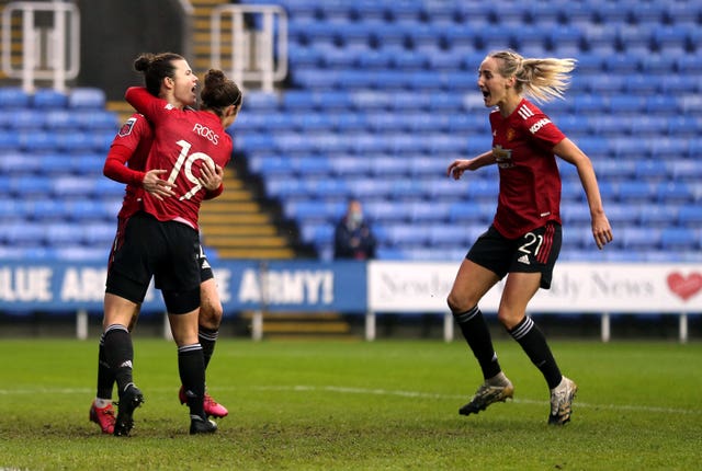 Manchester United stayed three points clear at the top of the Women's Super League with victory over Reading