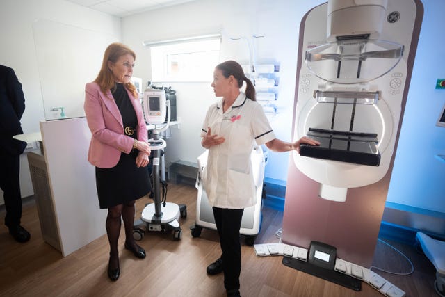 Sarah, Duchess of York, is shown a contrast enhanced mammography machine 