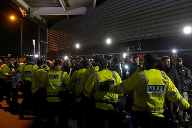 Police officers outside Villa Park