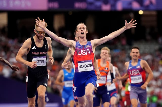 Josh Kerr, left, finishes second as American Cole Hocker celebrates winning the men’s 1500m