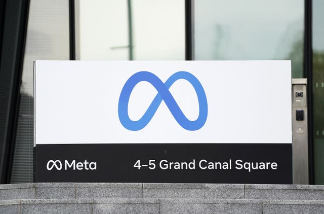 A sign saying Meta outside an office building