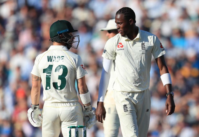 Jofra Archer, right, and Australian centurion Matthew Wade continually exchange words during a tense afternoon battle