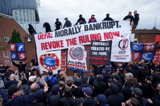 Crystal Palace fans stage a protest against UEFA's decision to exclude the club from the Europa League