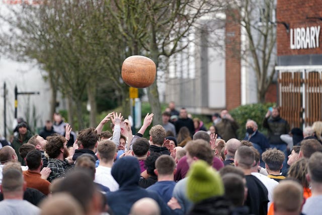 Players take part in the Atherstone Ball Game in Atherstone, Warwickshire