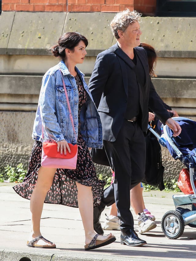 Emmerdale actor Mark Jordon and his partner Laura Norton arrive at Manchester Minshull Street Crown Court