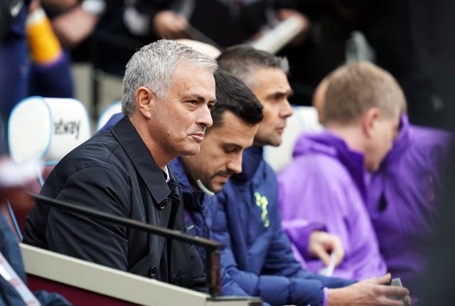 Jose Mourinho, Joao Sacramento and Nuno Santos, from left, on the Tottenham bench with 