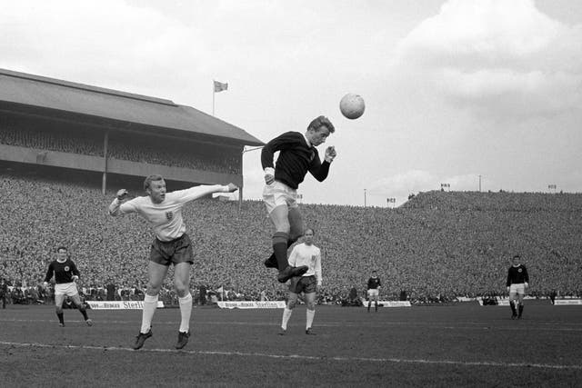 Bobby Moore (left) and Denis Law