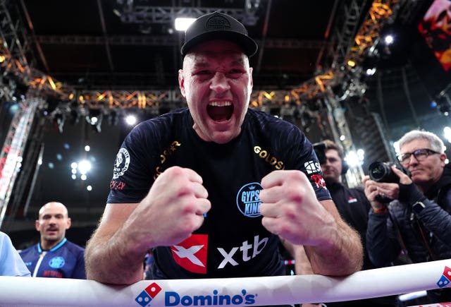 Tyson Fury celebrates his victory against Arslanbek Makhmudov at Tottenham Hotspur Stadium