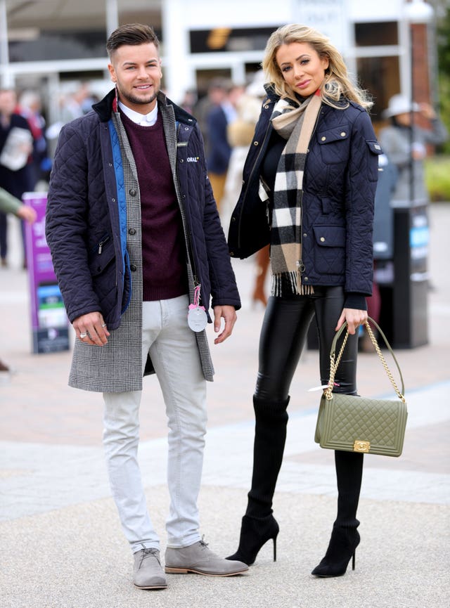 Chris Hughes and Olivia Attwood during Ladies Day of the 2018 Cheltenham Festival (Aaron Chown/PA)